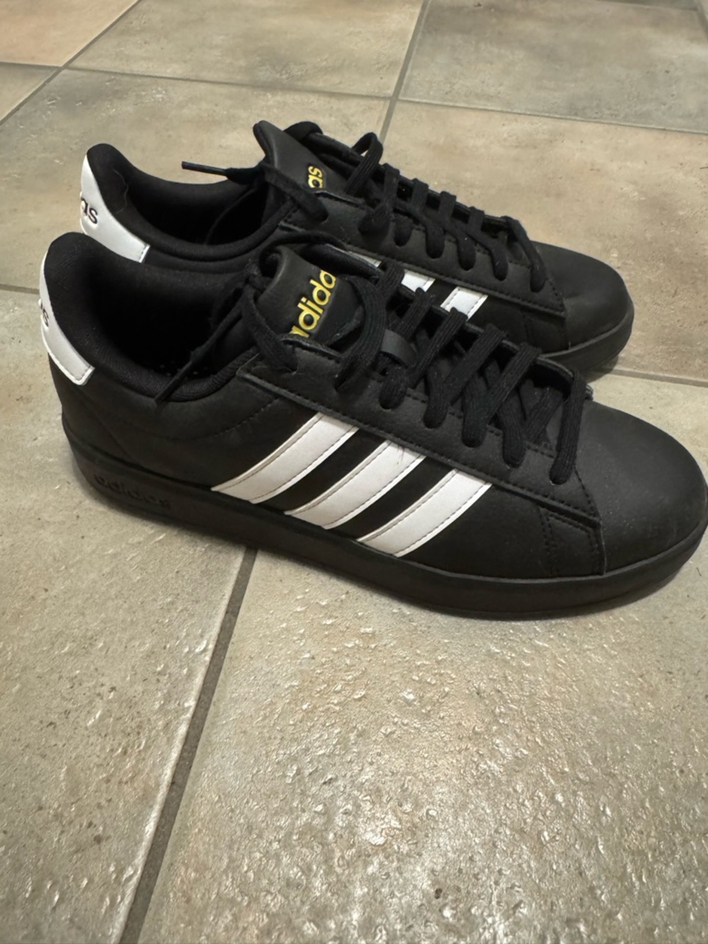 Black and white adidas Grand Court 2.0